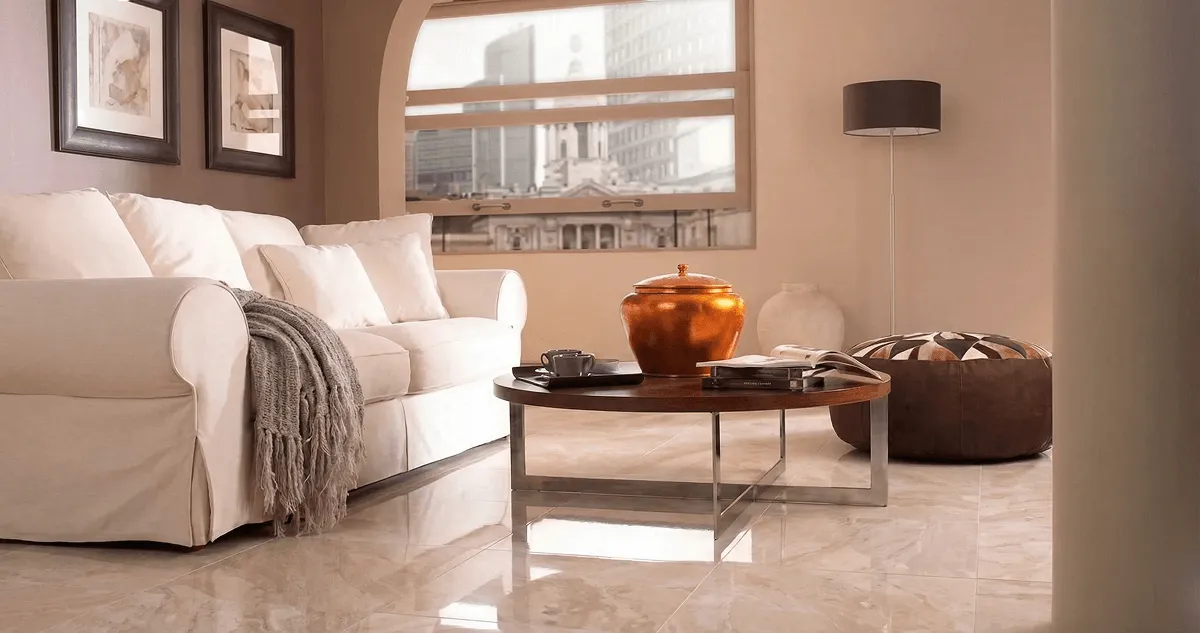 Modern living room with professionally installed marble flooring, a beige sofa, coffee table in San Francisco, CA
