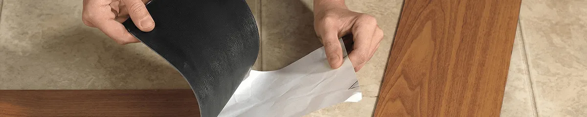 A professional installing vinyl flooring in San Francisco, CA